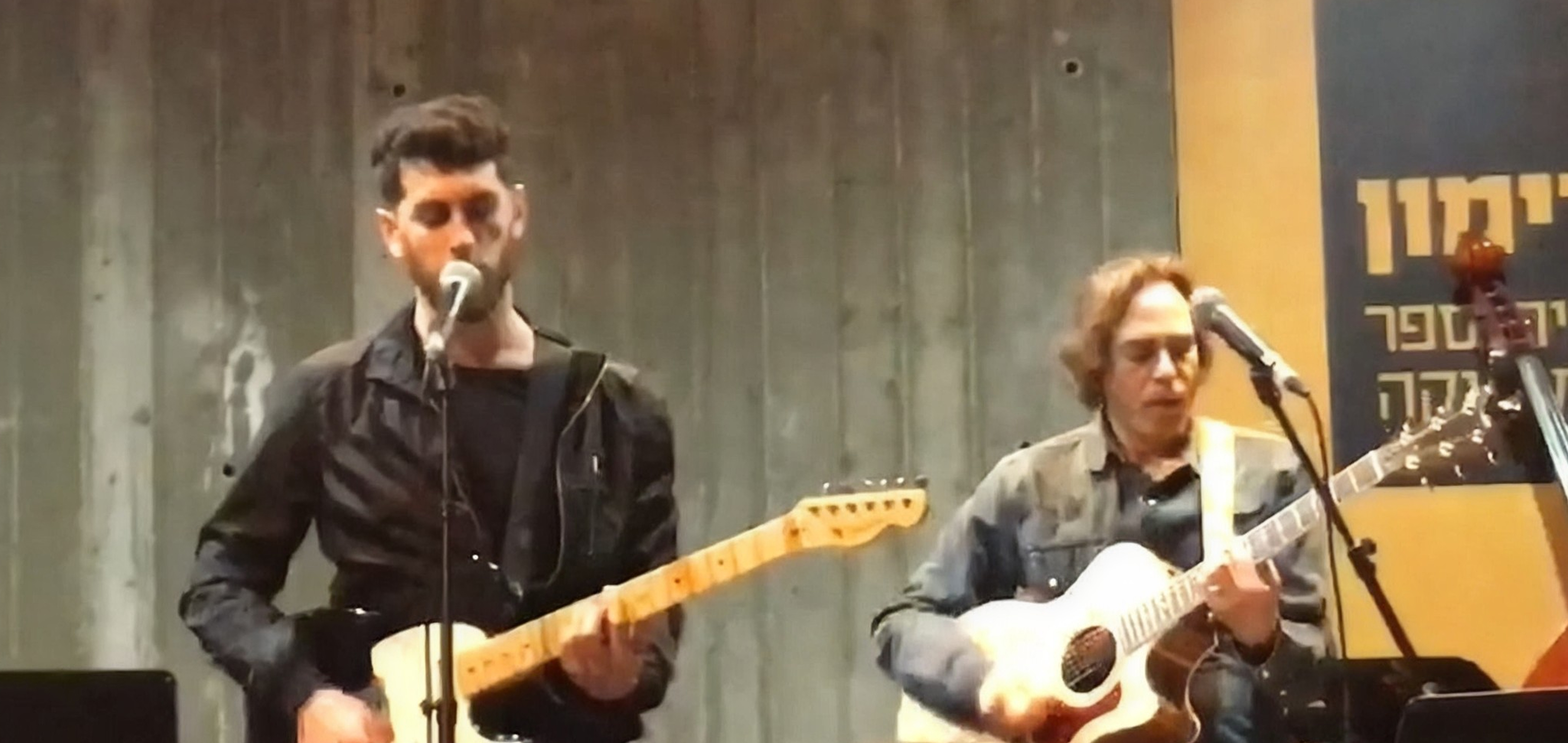 Elad performing his song on stage with Hemi Rudner